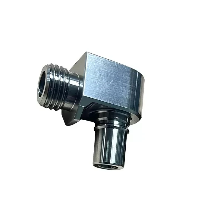 CNC-machined stainless steel 90-degree liquid-cooling elbow adapter with a male threaded inlet and compact connector outlet